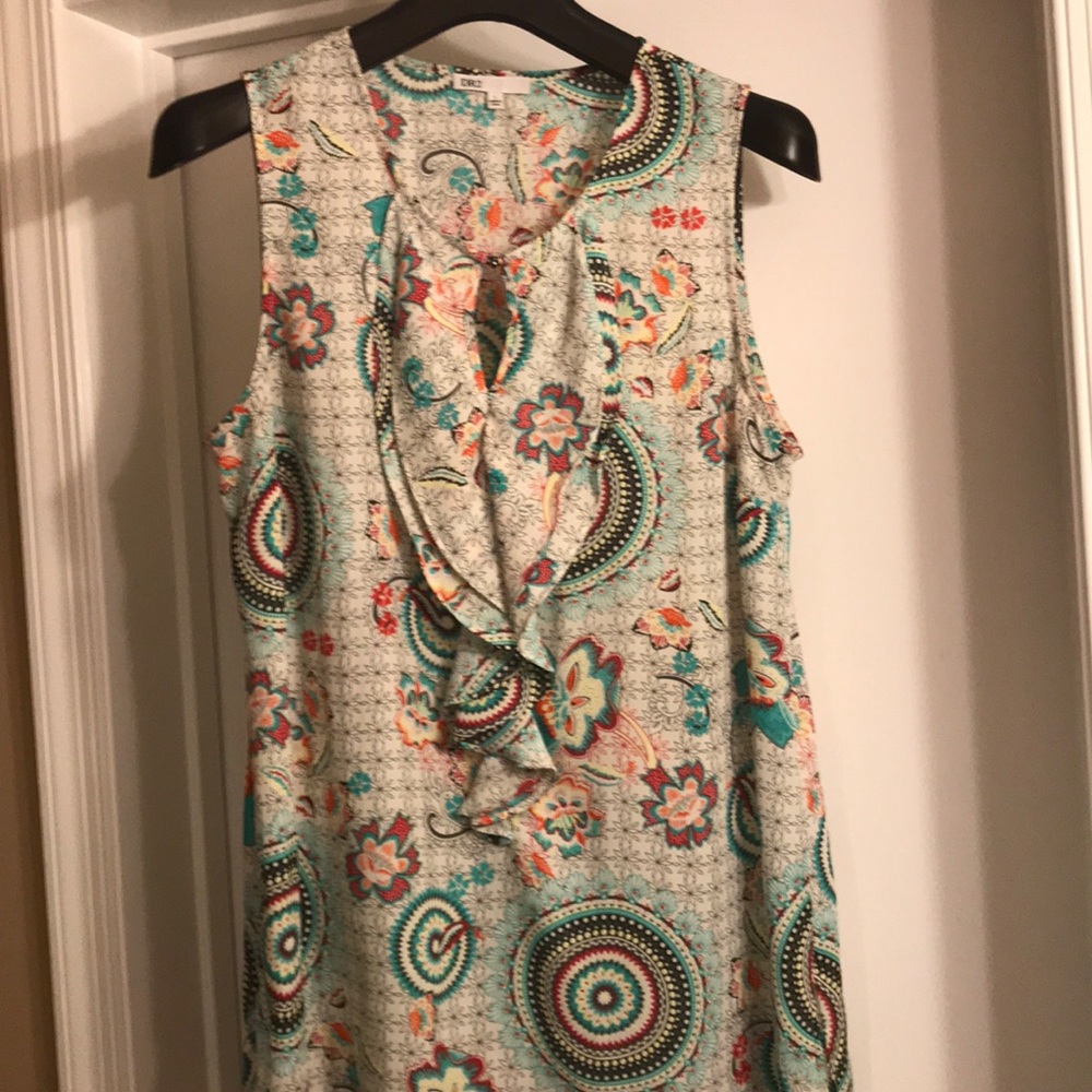 Asymmetrical sleeveless top